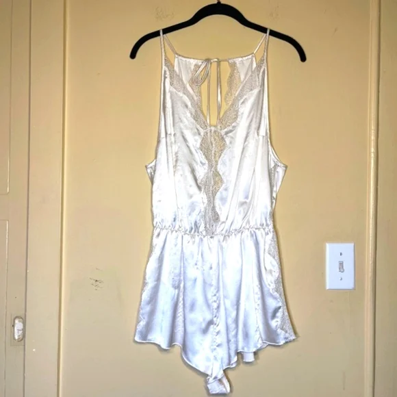 Elegant Cream Lace-Trimmed Romper